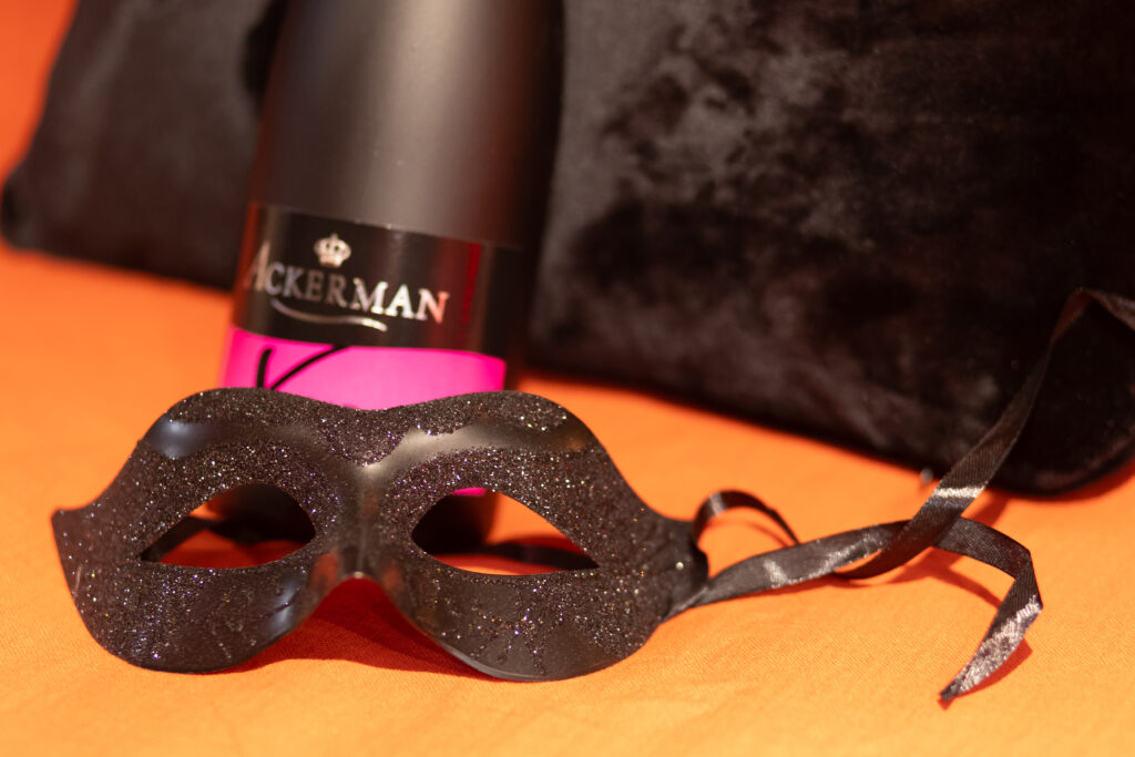 masque avec bouteille de pétillant